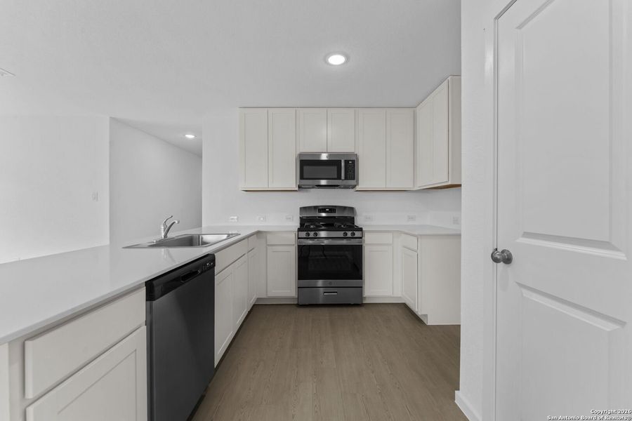 Furnished interior view inside a new home in Voss Farms, New Braunfels (Image 7).