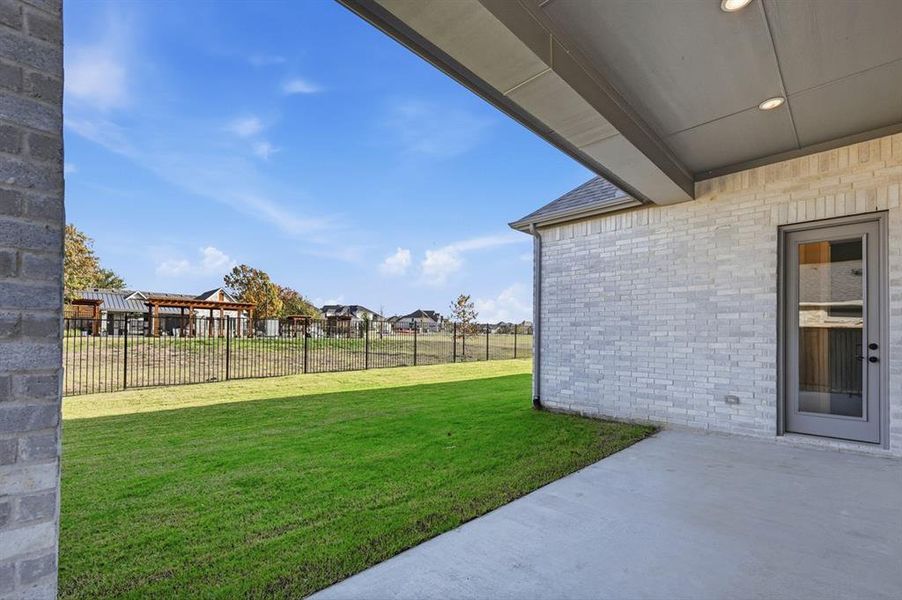 Exterior details and patio area of a home in Saddle Star Estates, Rockwall (Image 3).