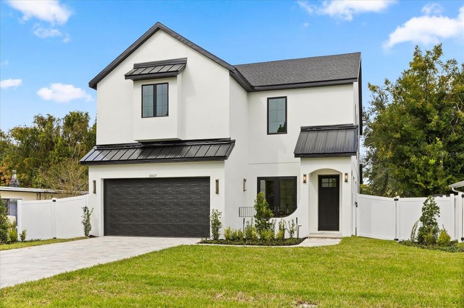 Front exterior of a new home in , Orlando, FL, highlighting curb appeal (Image 29). Front exterior of a new home in , Orlando, FL, highlighting curb appeal (Image 29).