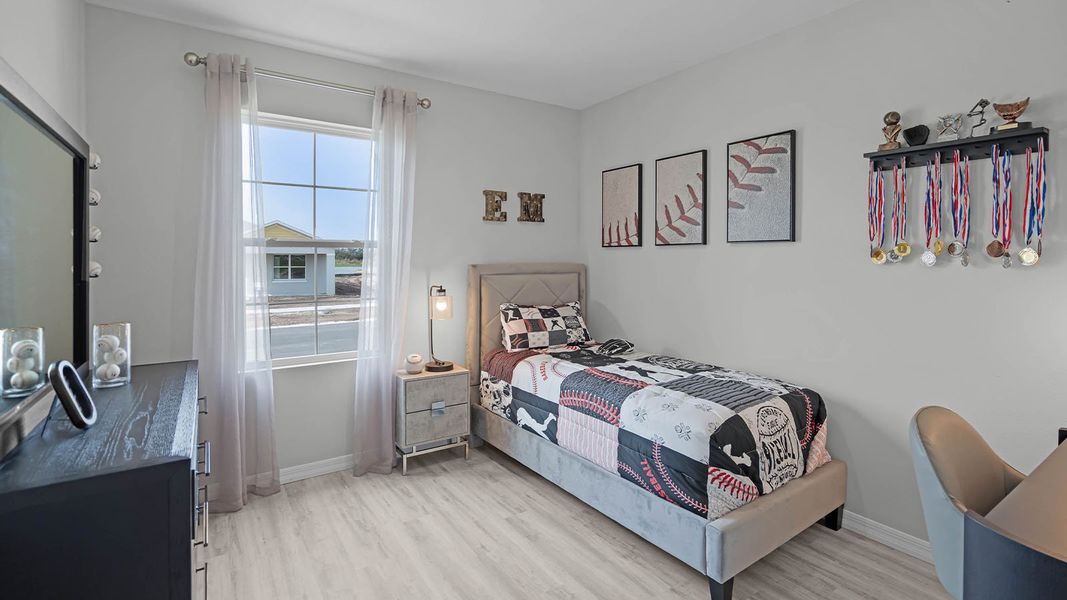 Furnished interior view inside a new home in Harmony at Lake Eloise, Winter Haven (Image 30).