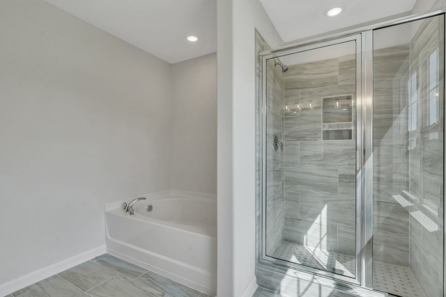 Representative furnished interior of a home built from the The Hatteras by Smith Family Homes in Ramsey Landing, Rincon (Image 16).