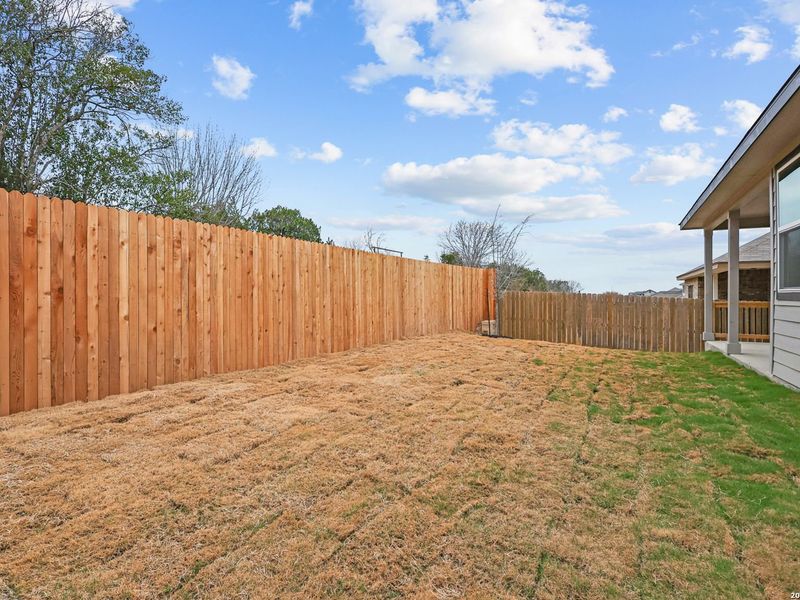 Exterior details and patio area of a home in Royal Crest, San Antonio (Image 22).
