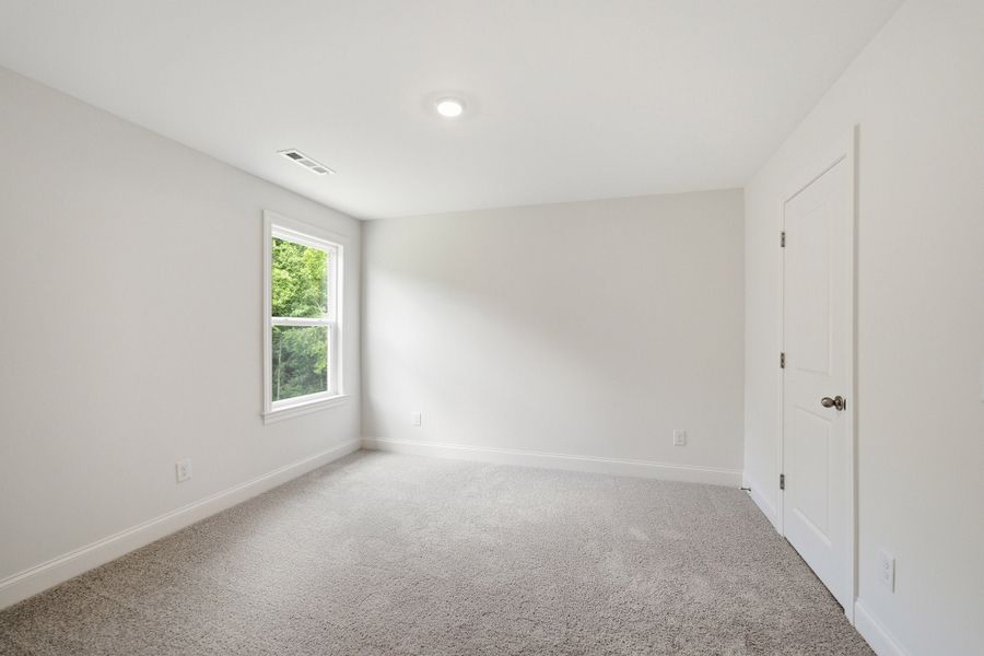 Spacious, unfurnished interior of a new home in Aden Woods, Fairview (Image 38).