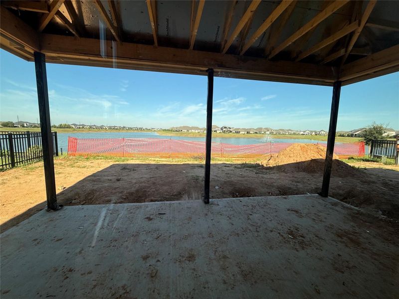 Extended covered back patio with amazing lake views Extended covered back patio with amazing lake views