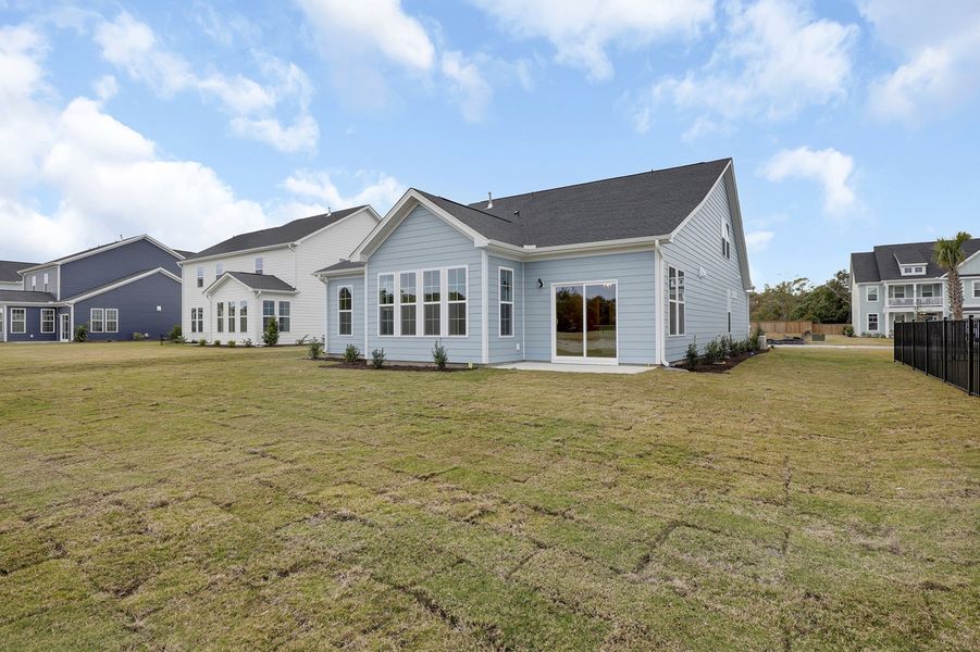 Exterior details and patio area of a home in East Wynd, Hampstead (Image 4).