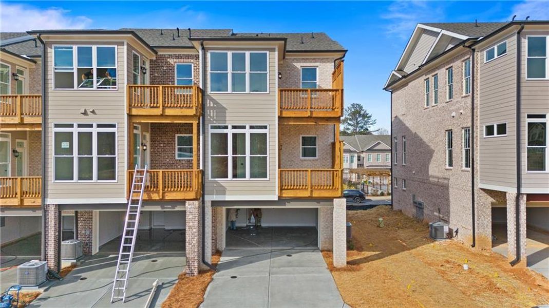 In-progress construction of a new home in Ward's Crossing Townhomes, Johns Creek, GA (Image 31).