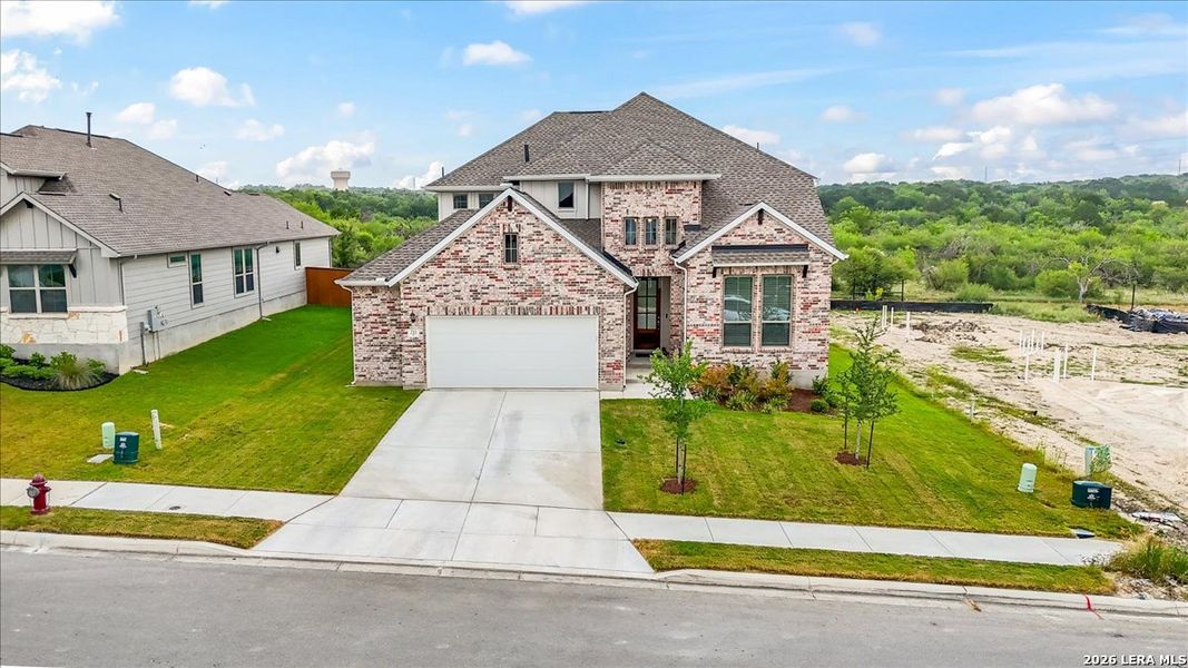 Front exterior of a new home in Foxbrook, Cibolo, TX, highlighting curb appeal (Image 22).