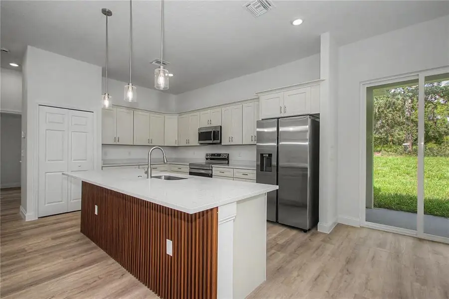 Furnished interior view inside a new home in , Ocala (Image 7).