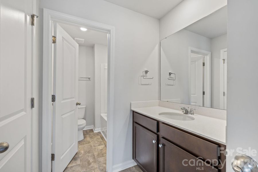 Furnished interior view inside a new home in McFarland Estates, York (Image 12).