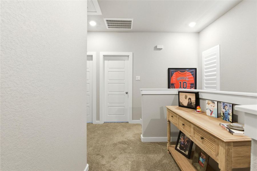 Furnished interior view inside a new home in Dunvale Village - Townhome Collection, Houston (Image 17).
