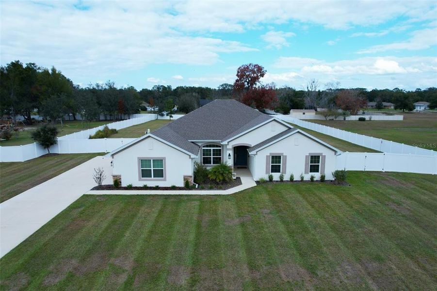 Front exterior of a new home in Dorchester, Ocala, FL, highlighting curb appeal (Image 34).