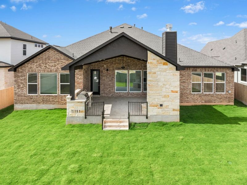 Exterior details and patio area of a home in Santa Rita Ranch, Liberty Hill (Image 27).