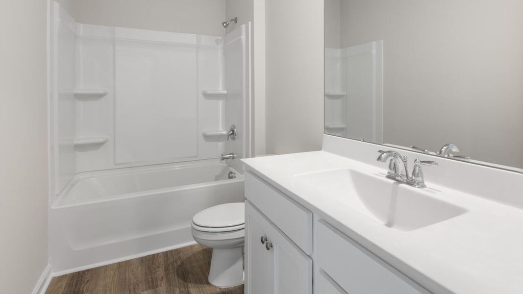 Furnished interior view inside a new home in Saltgrass Landing, Winnabow (Image 11).