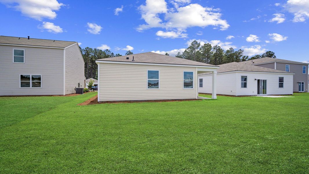 Front exterior of a new home in The Retreat at East Argent, Ridgeland, SC, highlighting curb appeal (Image 23). Front exterior of a new home in The Retreat at East Argent, Ridgeland, SC, highlighting curb appeal (Image 23).