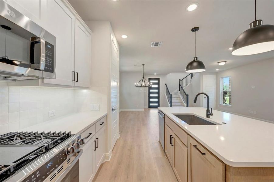 Furnished interior view inside a new home in Painted Tree Woodland West – Cottages, McKinney (Image 11).