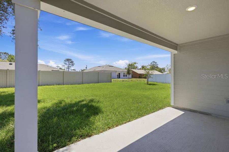 Exterior details and patio area of a home in Palm Coast, Palm Coast (Image 3).