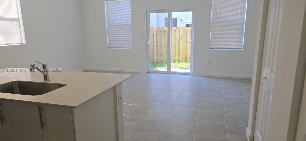 Spacious, unfurnished interior of a new home in Le Jardine, Florida City (Image 20).