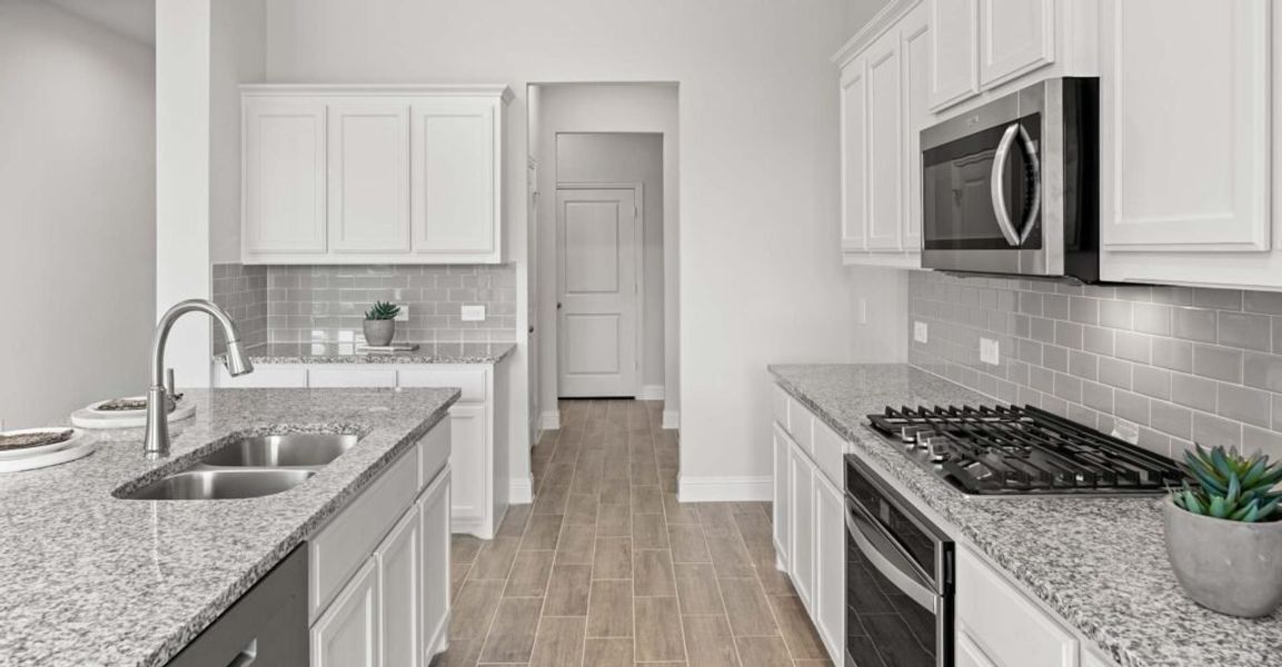 Representative exterior photo of a completed home built from the Hampton by Impression Homes in Still Water Lake, Godley, TX (Image 7). Representative exterior photo of a completed home built from the Hampton by Impression Homes in Still Water Lake, Godley, TX (Image 7).