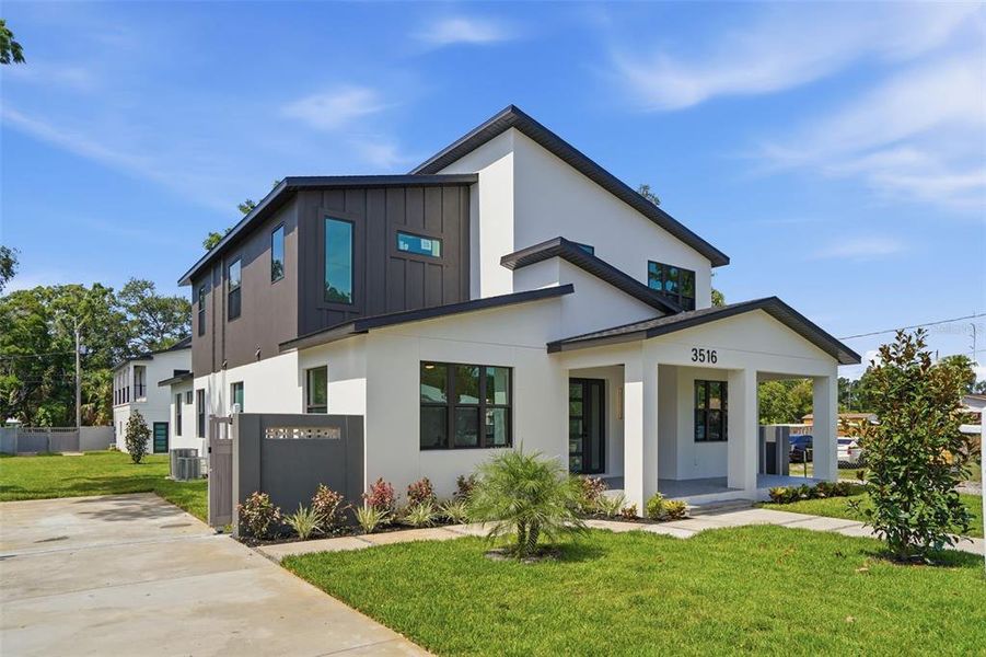Front exterior of a new home in , St. Petersburg, FL, highlighting curb appeal (Image 30). Front exterior of a new home in , St. Petersburg, FL, highlighting curb appeal (Image 30).