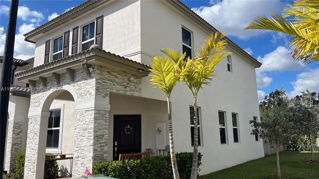 Exterior details and patio area of a home in , Miami (Image 3). Exterior details and patio area of a home in , Miami (Image 3).