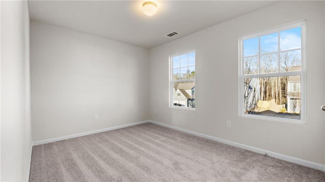 Spacious, unfurnished interior of a new home in The Reserve at Willow Oaks, Canton (Image 17).