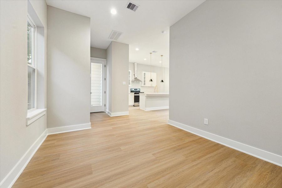 Flex room is perfect as formal dining room, home office or game room