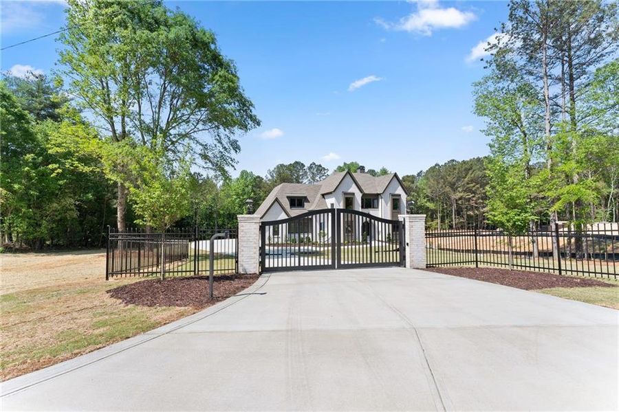Front exterior of a new home in , Flowery Branch, GA, highlighting curb appeal (Image 26).