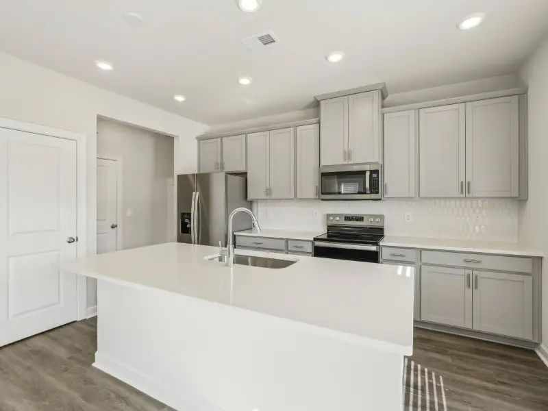 Furnished interior view inside a new home in Harper Landing, Stanley (Image 4).