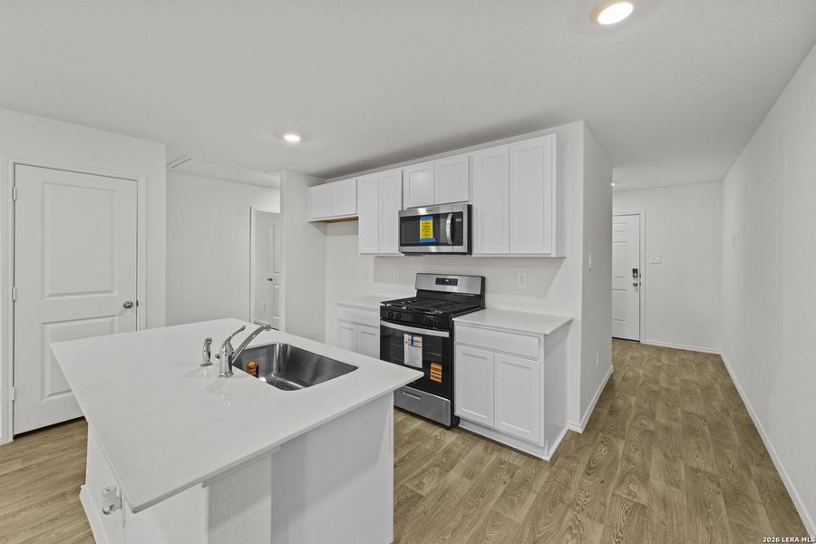 Furnished interior view inside a new home in Hickory Ridge, Elmendorf (Image 13).