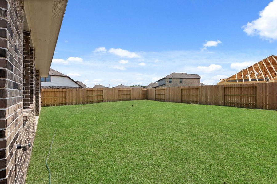 The backyard is perfect for family gatherings, social events or simply unwinding in the fresh air.