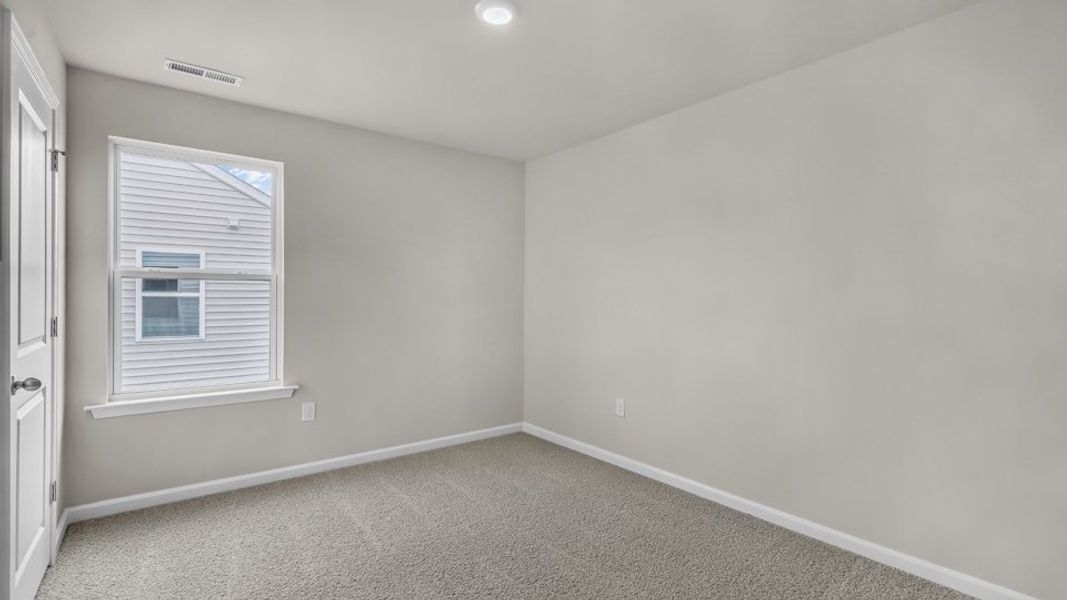 Spacious, unfurnished interior of a new home in Wilson's Ridge, Smithfield (Image 26).
