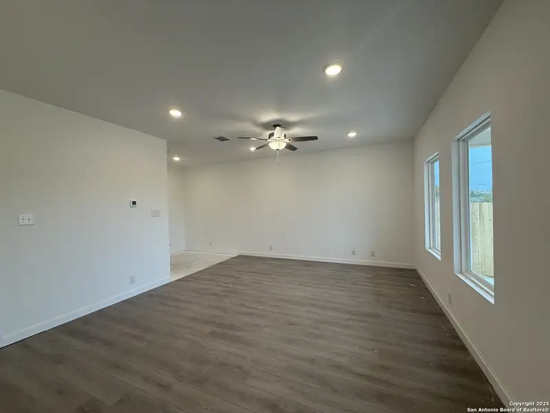 Spacious, unfurnished interior of a new home in Meadows at Hennersby Hollow 40's, San Antonio (Image 15).