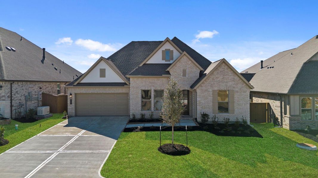 Front exterior of a new home in Chambers Creek, Willis, TX, highlighting curb appeal (Image 17).