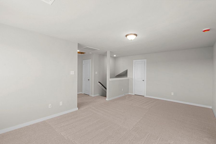 Spacious, unfurnished interior of a new home in Windrose Green, Angleton (Image 22).