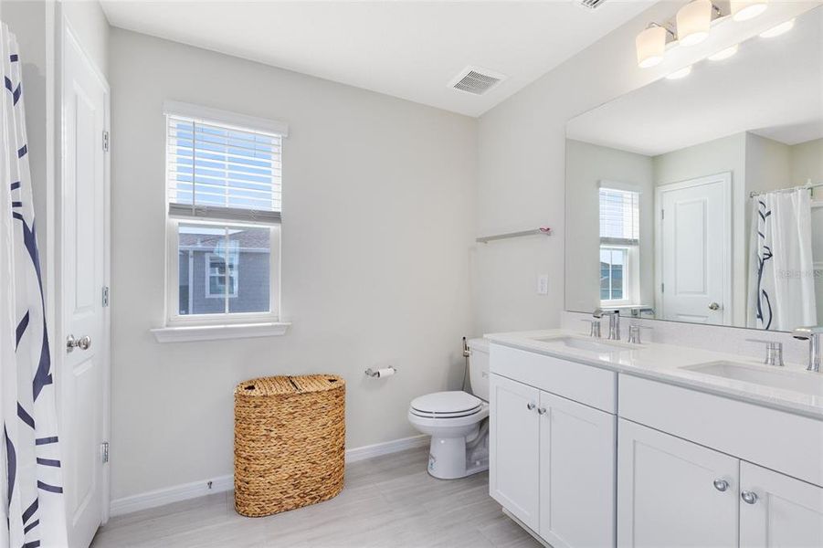 Furnished interior view inside a new home in Isles of Lake Nona, Orlando (Image 18). Furnished interior view inside a new home in Isles of Lake Nona, Orlando (Image 18).