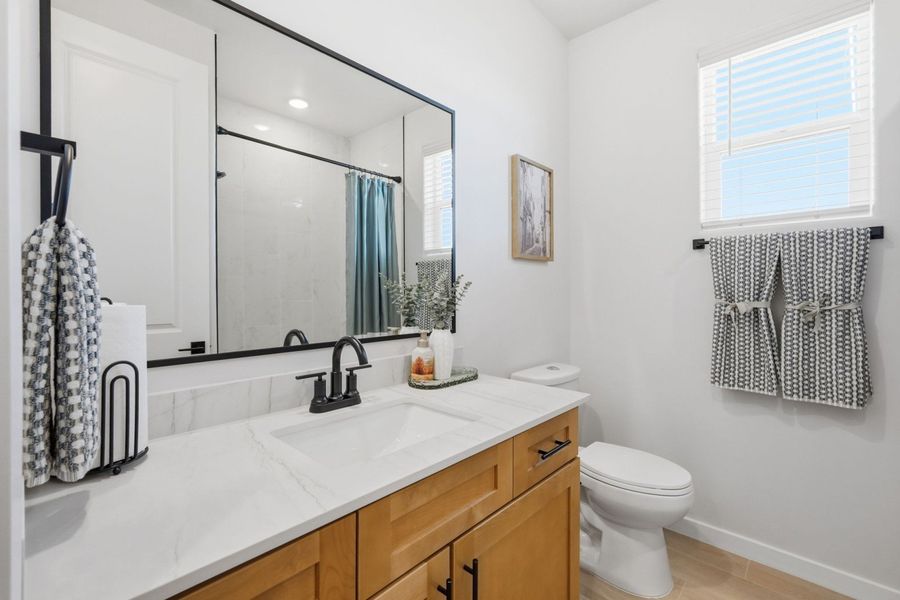 Representative furnished interior of a home built from the Valencia by Hakes Brothers in Verdancia, El Paso (Image 18).
