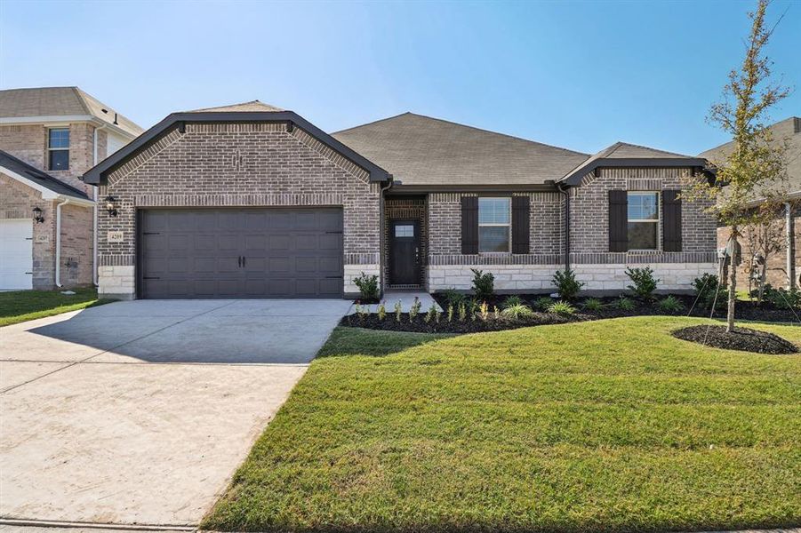 Front exterior of a new home in Lakehaven - Premier Series, Farmersville, TX, highlighting curb appeal (Image 1).