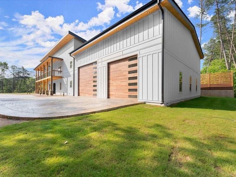 Exterior details and patio area of a home in , Dahlonega (Image 55).