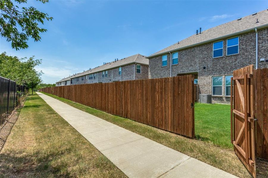 Front exterior of a new home in , Lewisville, TX, highlighting curb appeal (Image 21).