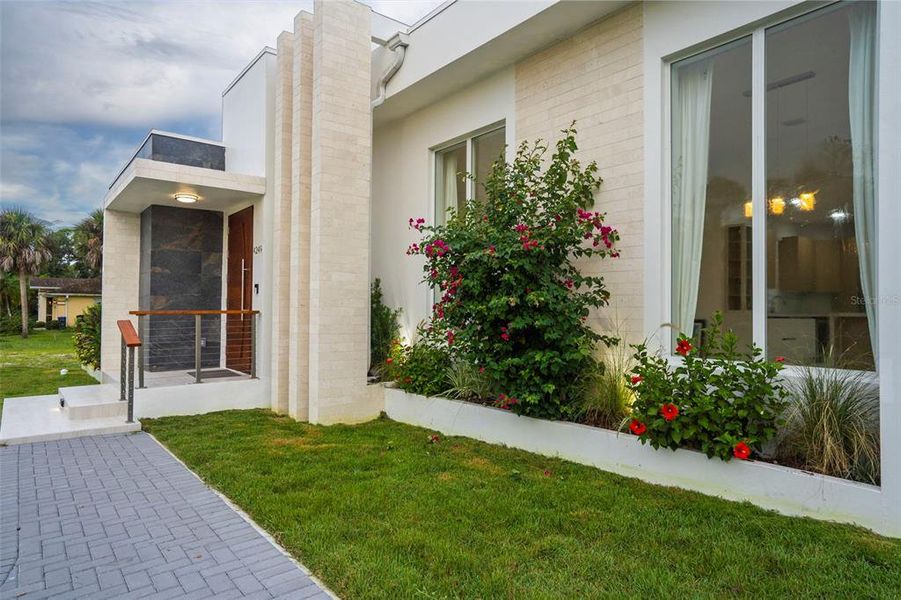 Front exterior of a new home in , North Port, FL, highlighting curb appeal (Image 27).
