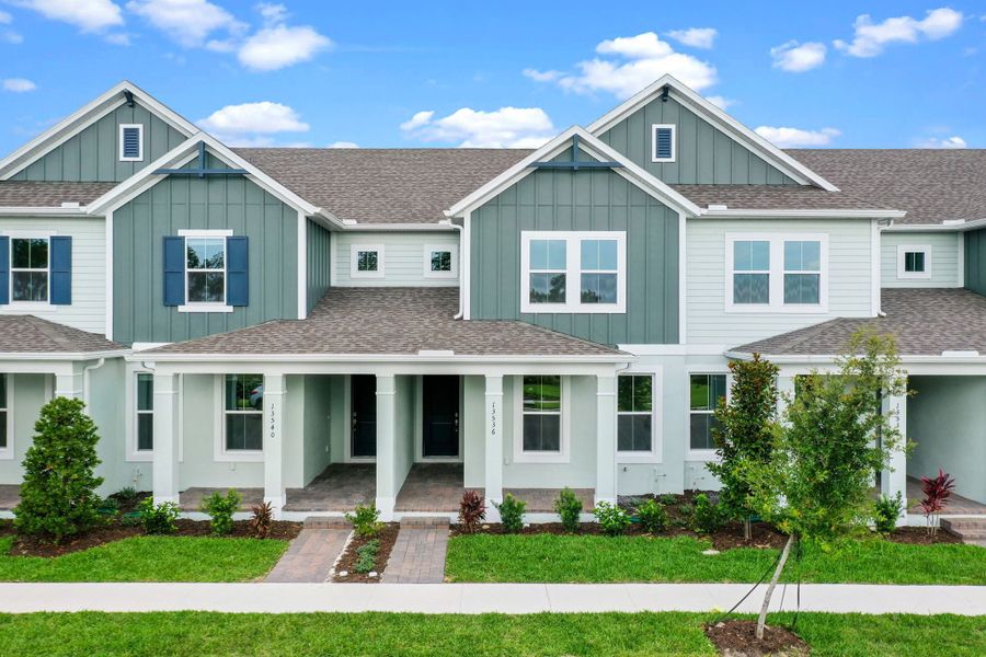 Representative exterior photo of a completed home built from the Newton by Rockwell Homes in Harvest at Ovation - Townhomes, Winter Garden, FL (Image 31). Representative exterior photo of a completed home built from the Newton by Rockwell Homes in Harvest at Ovation - Townhomes, Winter Garden, FL (Image 31).