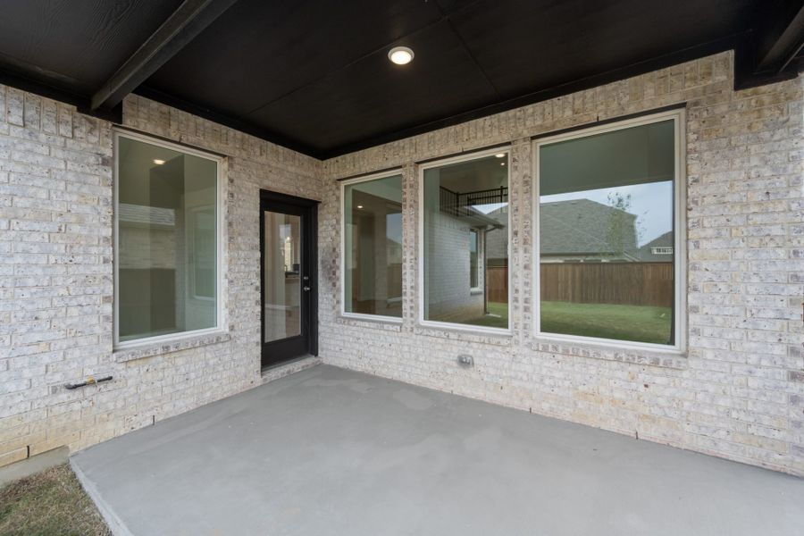 Exterior details and patio area of a home in Creekview Meadows, Pilot Point (Image 1). Exterior details and patio area of a home in Creekview Meadows, Pilot Point (Image 1).