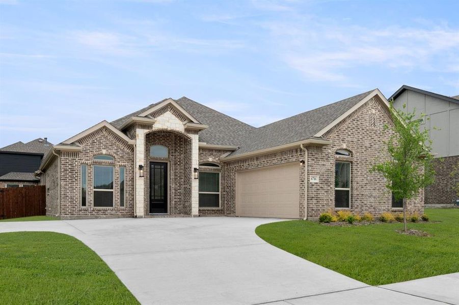 Front exterior of a new home in Llano Springs, Fort Worth, TX, highlighting curb appeal (Image 2).