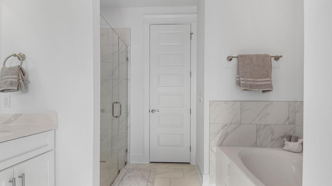 Representative furnished interior of a home built from the Jubilee by D.R. Horton in Breakfast Point East Phase II, Panama City Beach (Image 28).