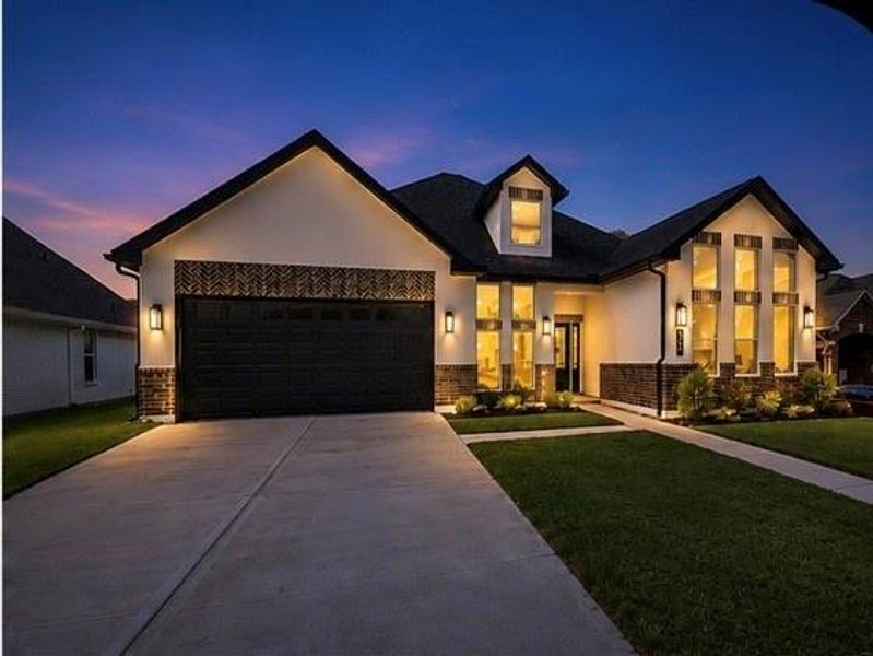 Front exterior of a new home in , Montgomery, TX, highlighting curb appeal (Image 1). Front exterior of a new home in , Montgomery, TX, highlighting curb appeal (Image 1).