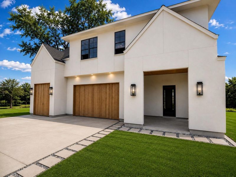 Beautiful wood garage doors, gas lanterns, iron side door unit