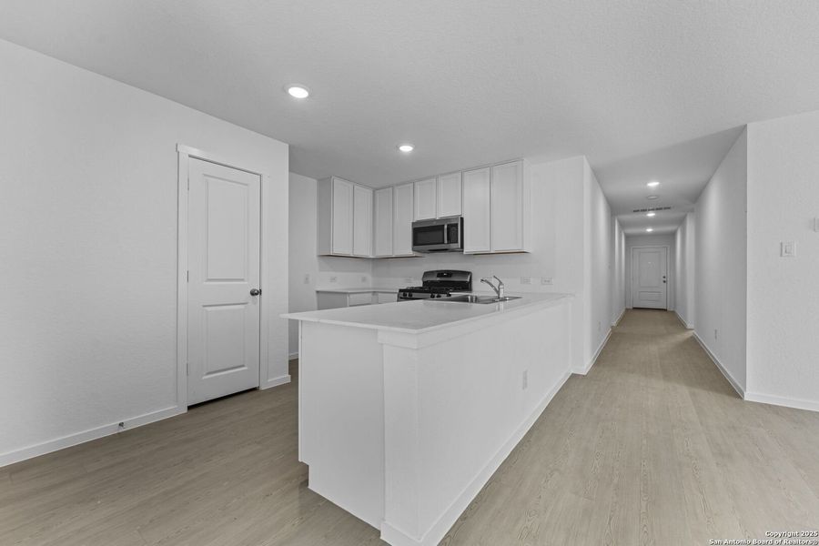 Furnished interior view inside a new home in Torian Village: Watermill Collection, San Antonio (Image 6).