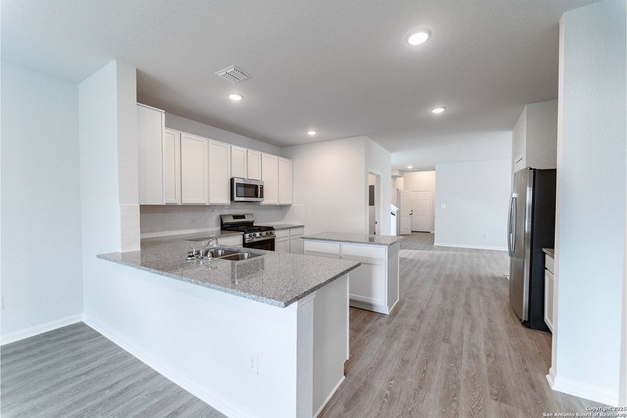 Furnished interior view inside a new home in Willow View, Converse (Image 5).