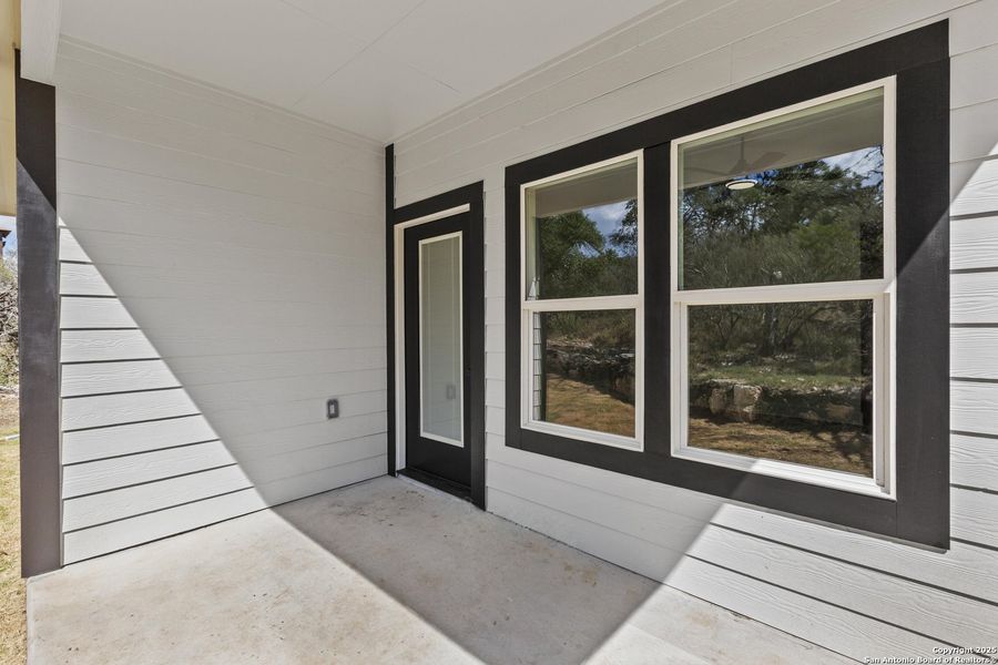 Exterior details and patio area of a home in , Spring Branch (Image 2). Exterior details and patio area of a home in , Spring Branch (Image 2).