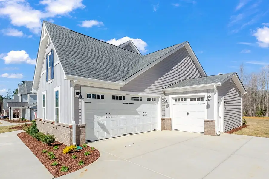Representative exterior photo of a completed home built from the The Chandler by RobuckHomes in Baylee Ridge, Selma, NC (Image 33). Representative exterior photo of a completed home built from the The Chandler by RobuckHomes in Baylee Ridge, Selma, NC (Image 33).